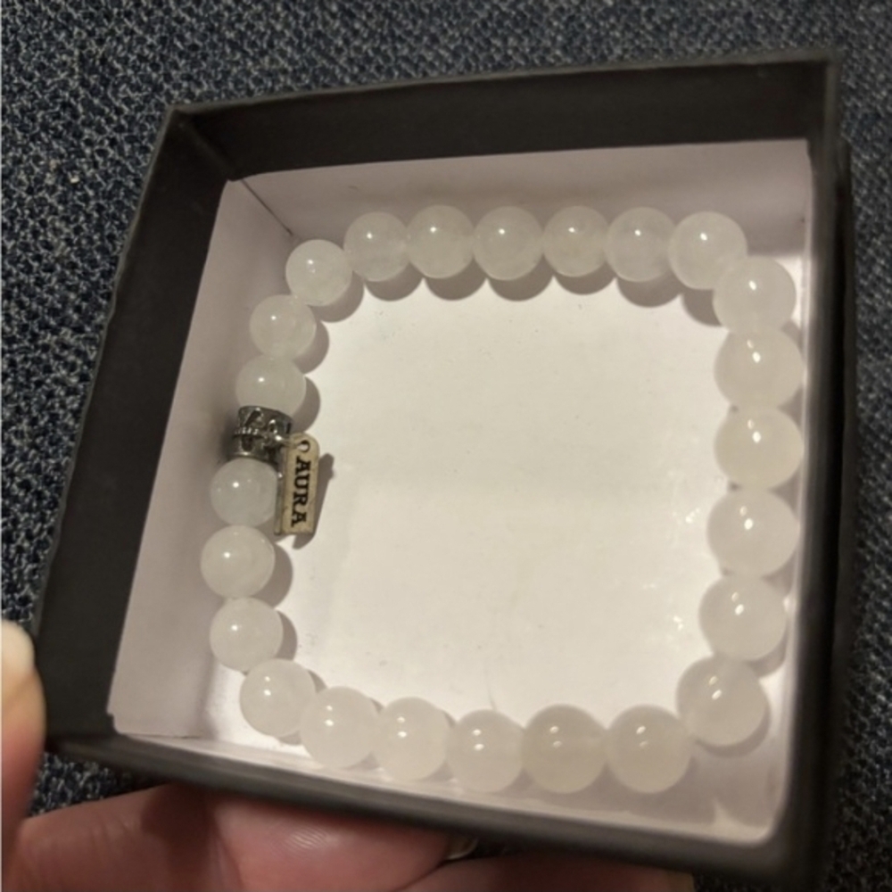 White Beaded Bracelet With Silver Charm. The All Healing Stone